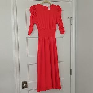 Beautiful Bright Orange Midi dress with a cinched